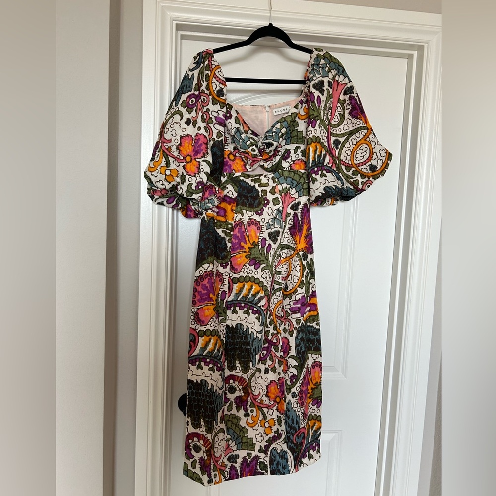 100% linen Rhode midi dress with cutout in front, lined. Worn once. Like new.